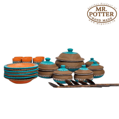 Handmade ceramic cookware set with colorful lids and utensils from Mr. Potter Sri Lanka.