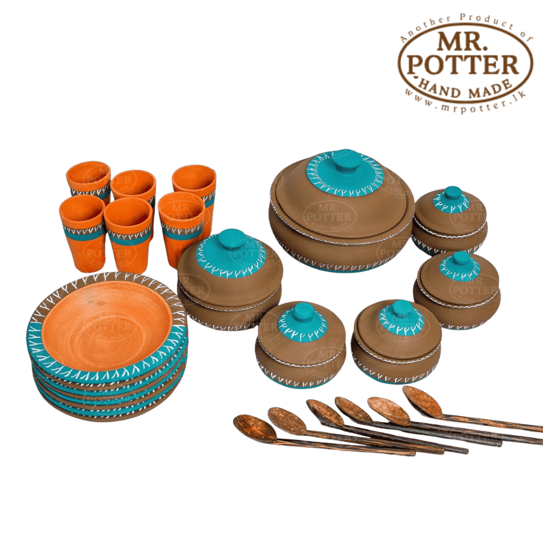 Handmade ceramic tea set with traditional Sri Lankan design, perfect for cultural gatherings.