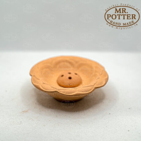 Handmade terracotta flower-shaped incense holder by Mr. Potter Sri Lanka.