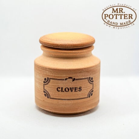 Handmade wooden spice jar for cloves, kitchen storage container, eco-friendly spice storage solution.