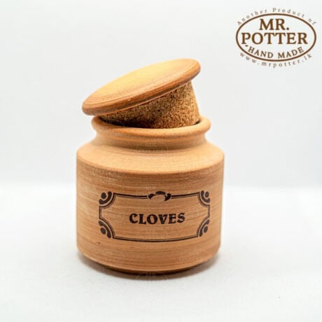 Handmade wooden spice jar labeled "Cloves" by Mr. Potter.