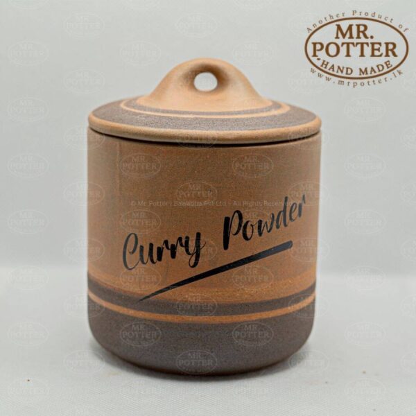 Handmade ceramic curry powder jar with lid, ideal for spice storage and kitchen decor.