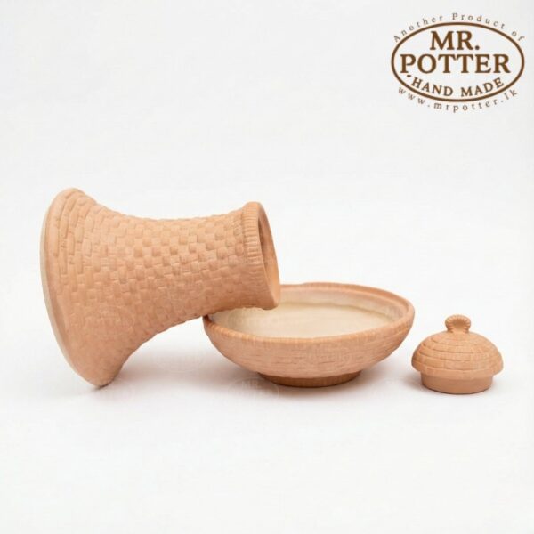 Handmade wooden kitchenware set from Mr. Potter, includes a mortar and pestle with a lid.