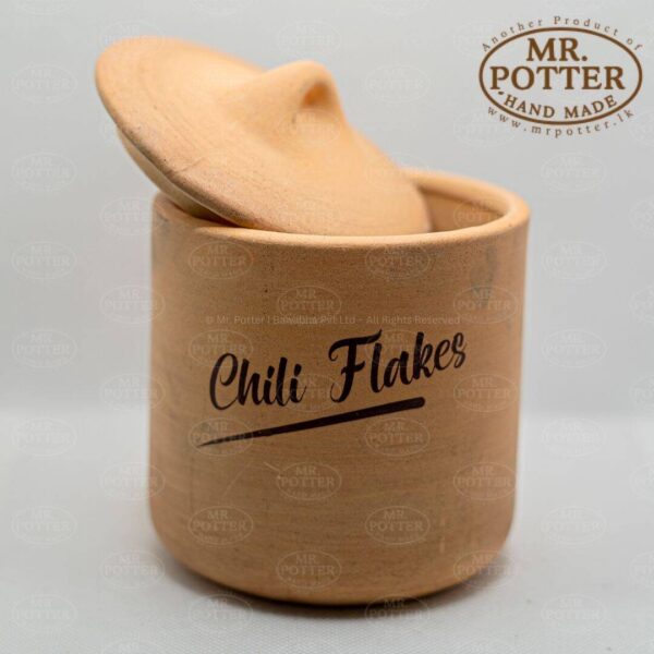 Handmade chili flakes ceramic container from Mr. Potter for spices, kitchen storage, and spice jars.