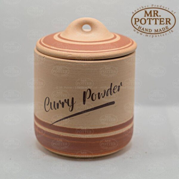 Handmade curry powder jar with lid from Mr. Potter, Sri Lanka, ceramic spice container.