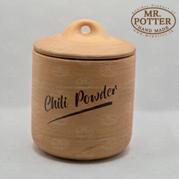 Handmade ceramic chili powder jar with lid, crafted by Mr. Potter in Sri Lanka.