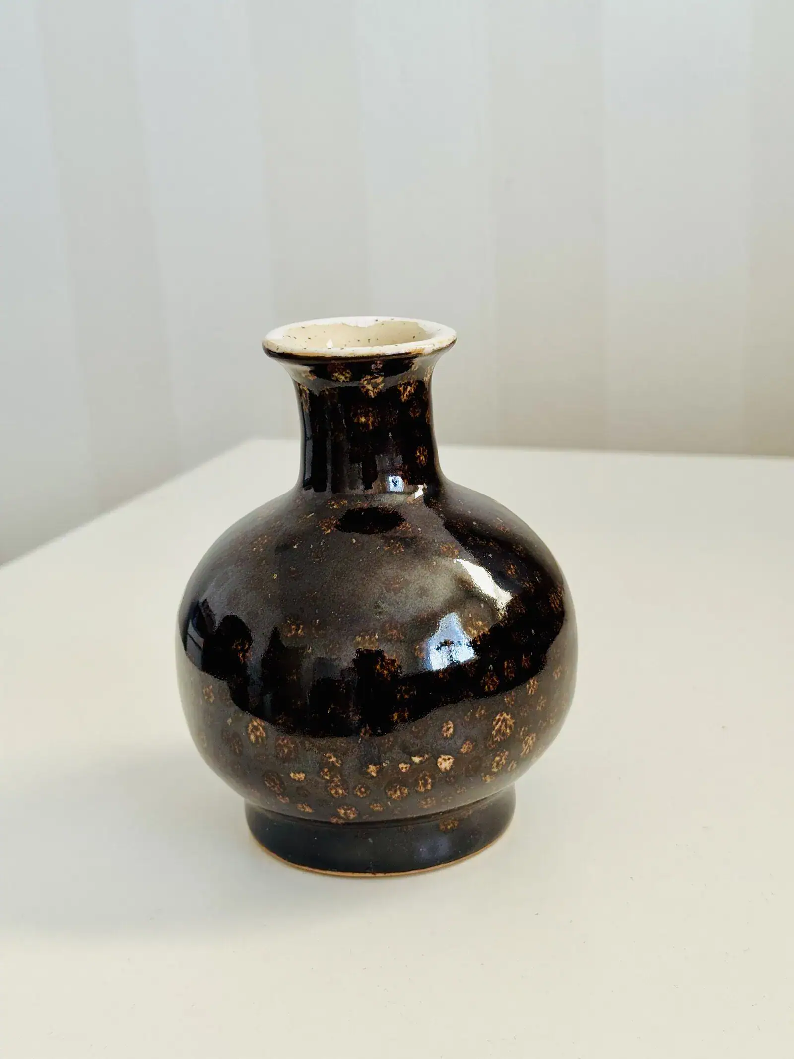 Deep brown crystalline glazed vase